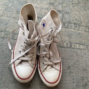 Perfectly broken in white Converse high tops